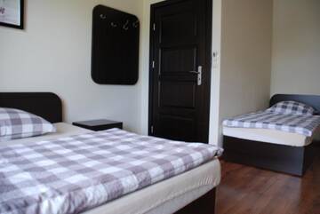 Фото номера Трехместный номер с собственной ванной комнатой Виллы VillaRenoma г. Надажин 4